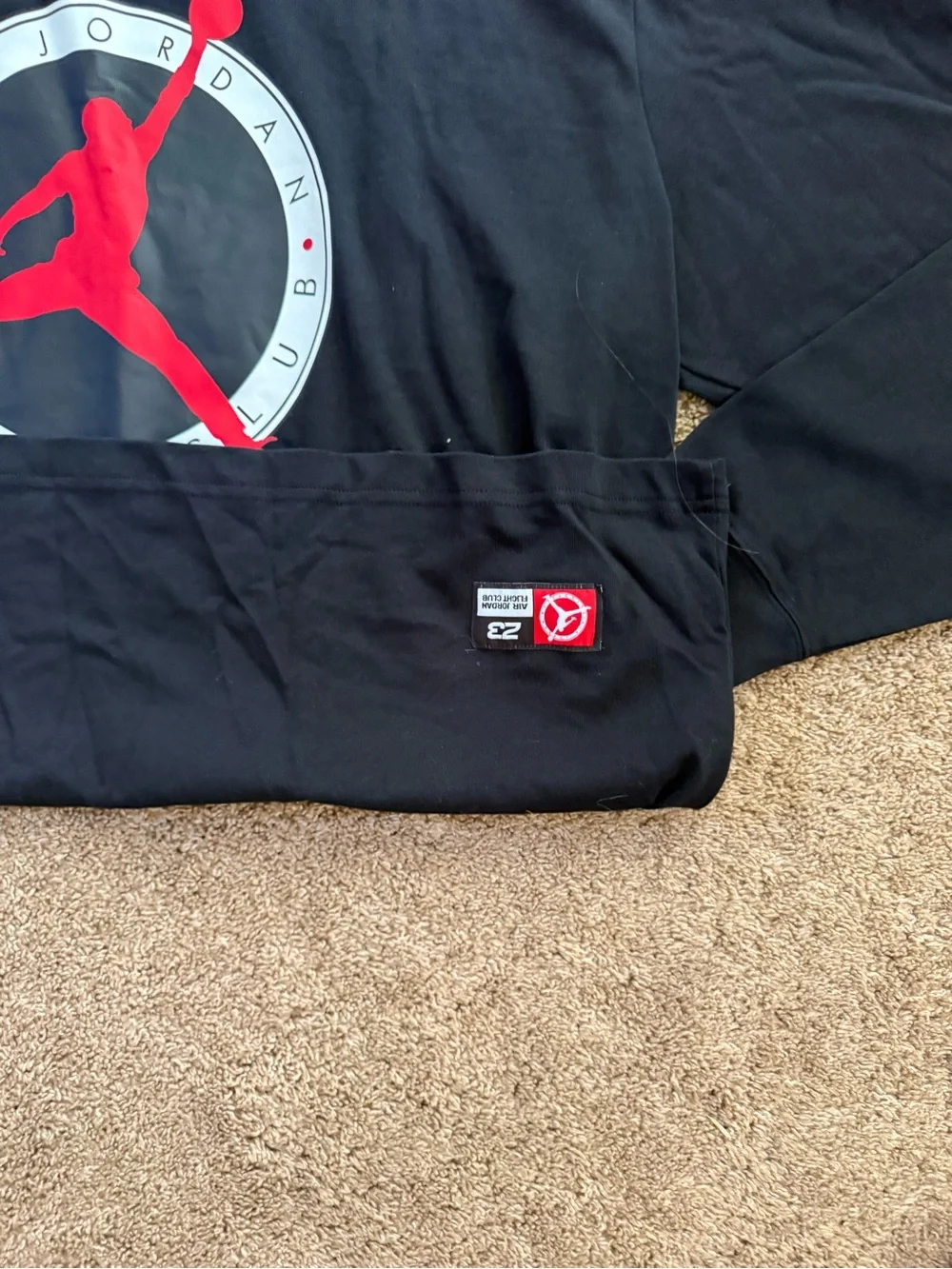 Jordan Black Crewneck Shirt with Red Jumpman Graphic